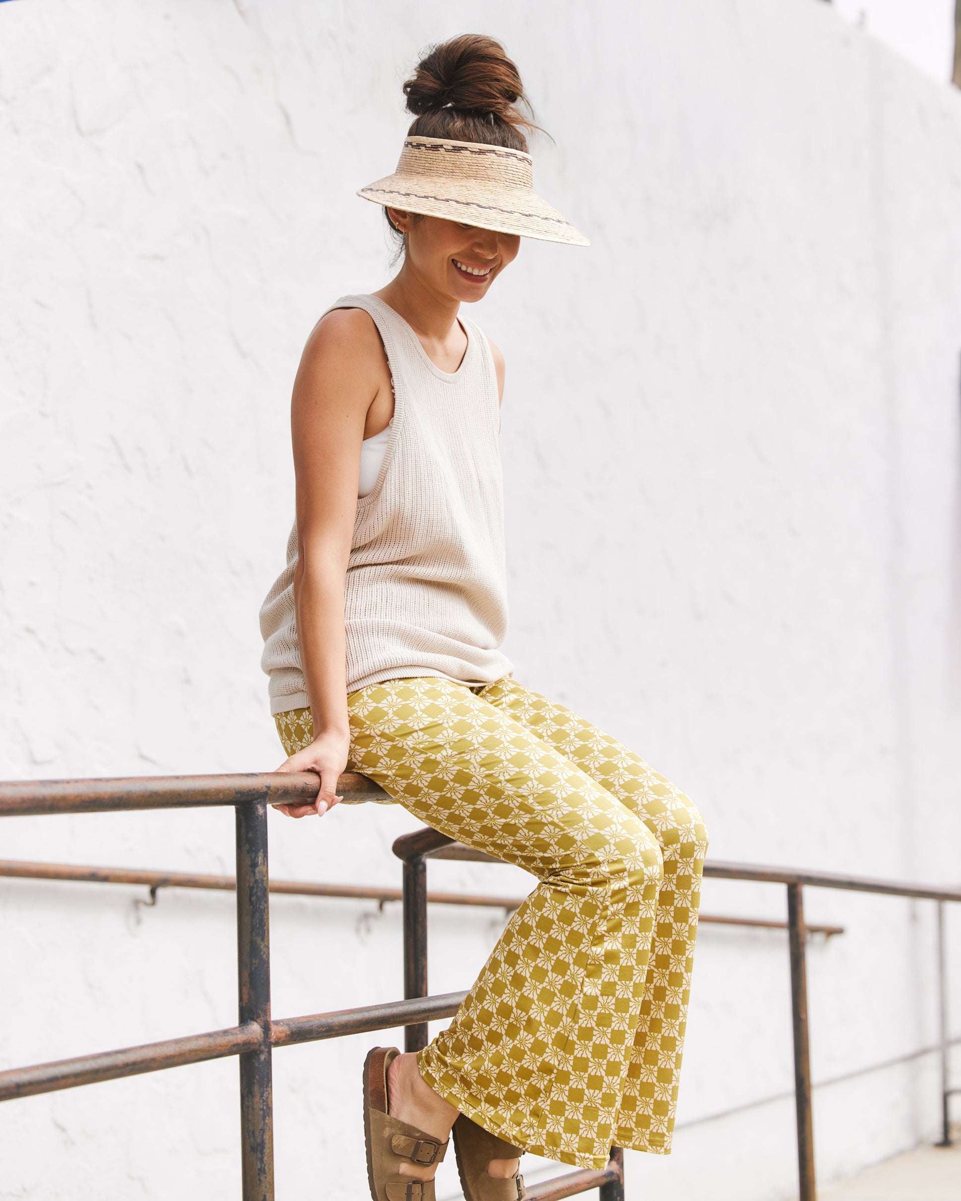 Hemlock female model wearing the Catalina Straw Visor