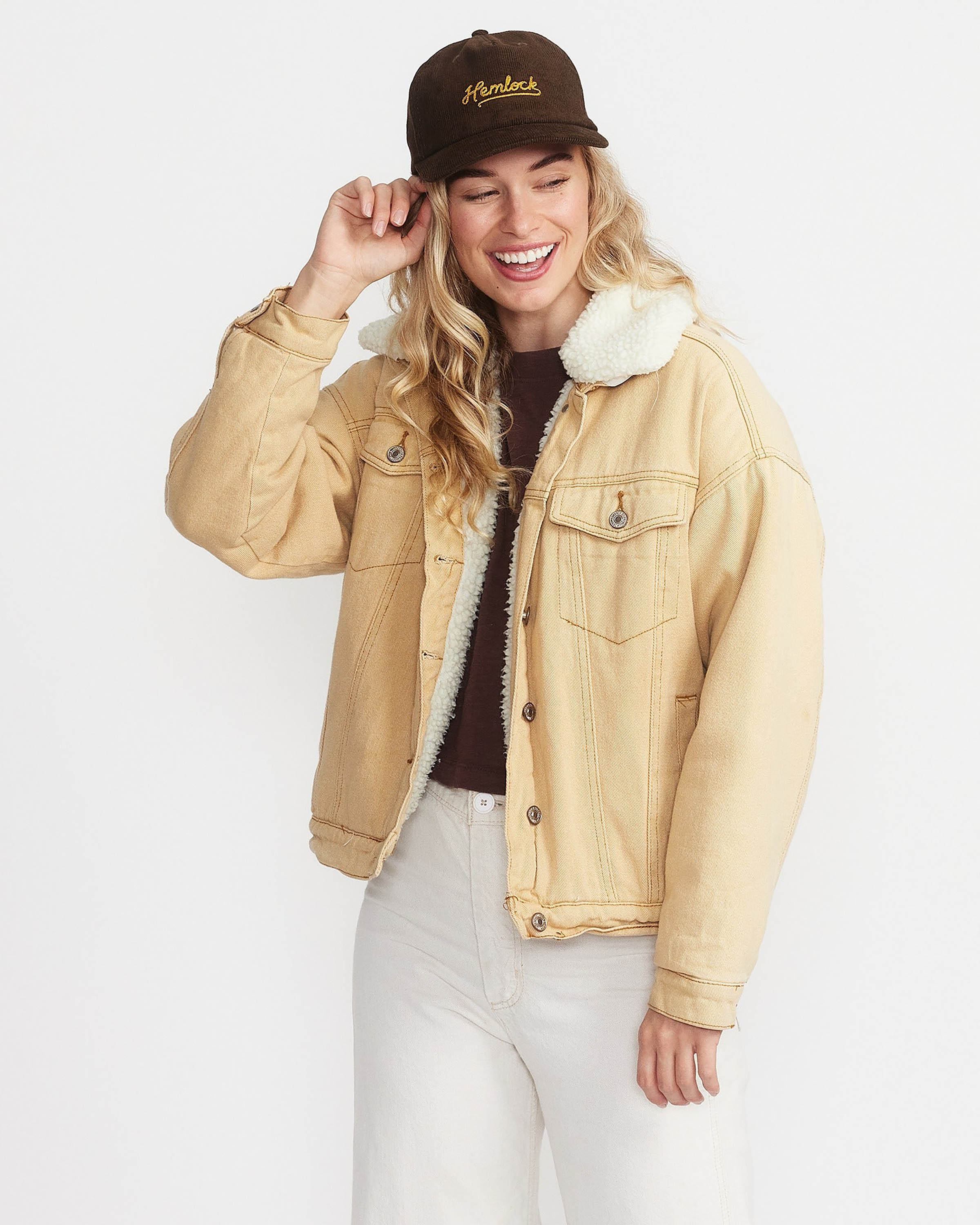Hemlock female model looking right wearing Hemlock Wesley Corduroy Baseball Hat in Mocha