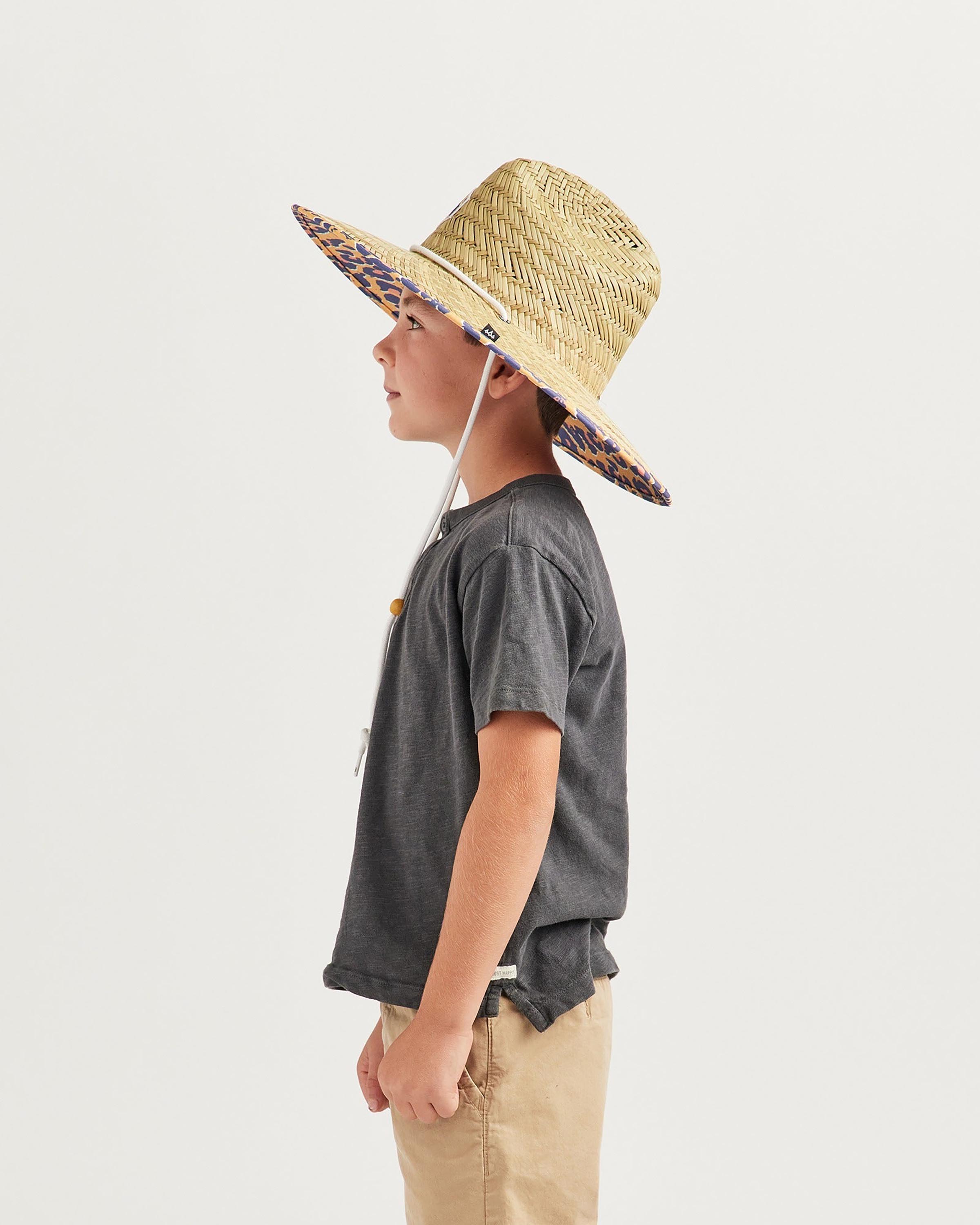 Hemlock Boy model wearing the Cub Big Kids Straw Lifeguard Hat