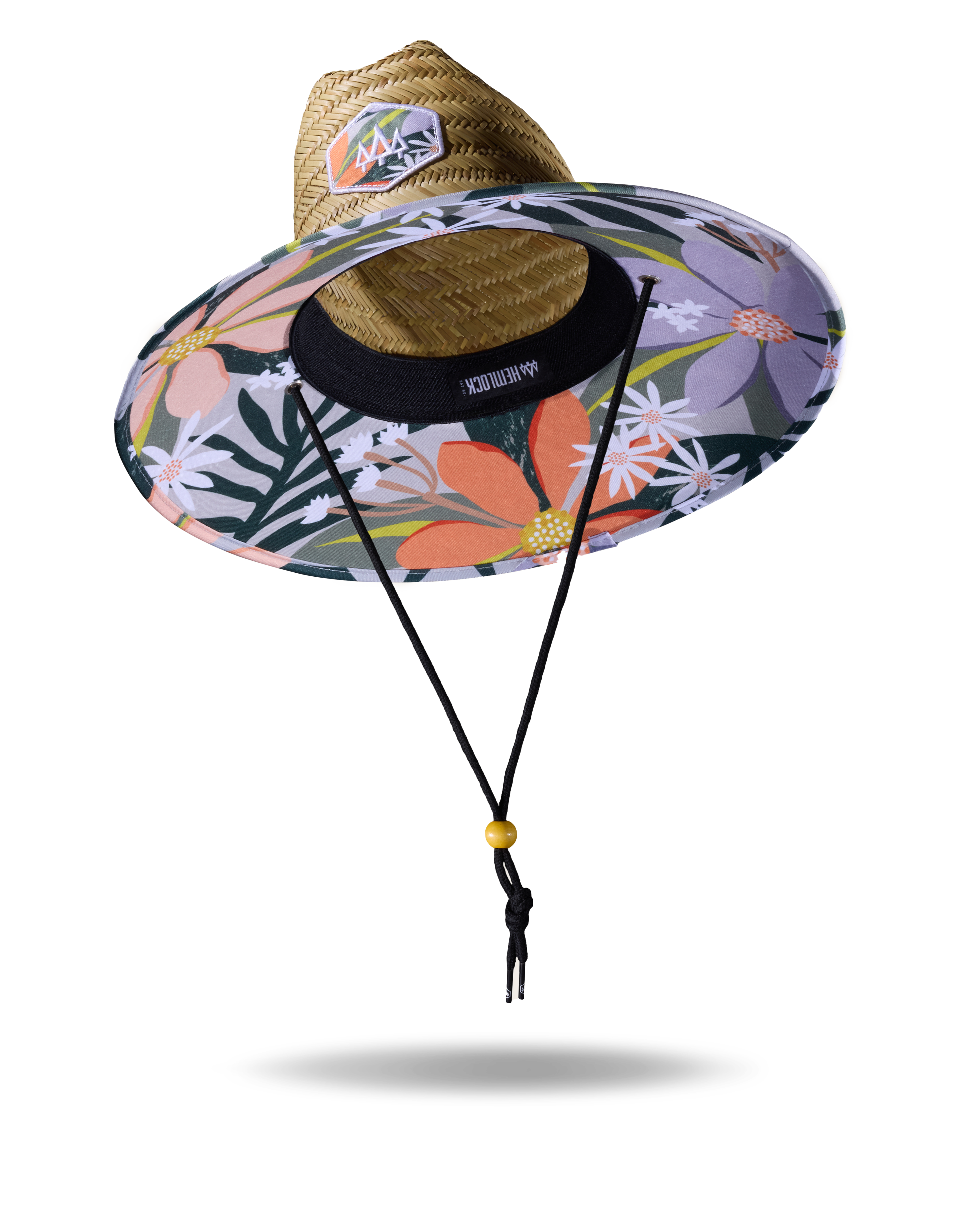 Colorful floral-patterned sun hat with a straw base on a white background