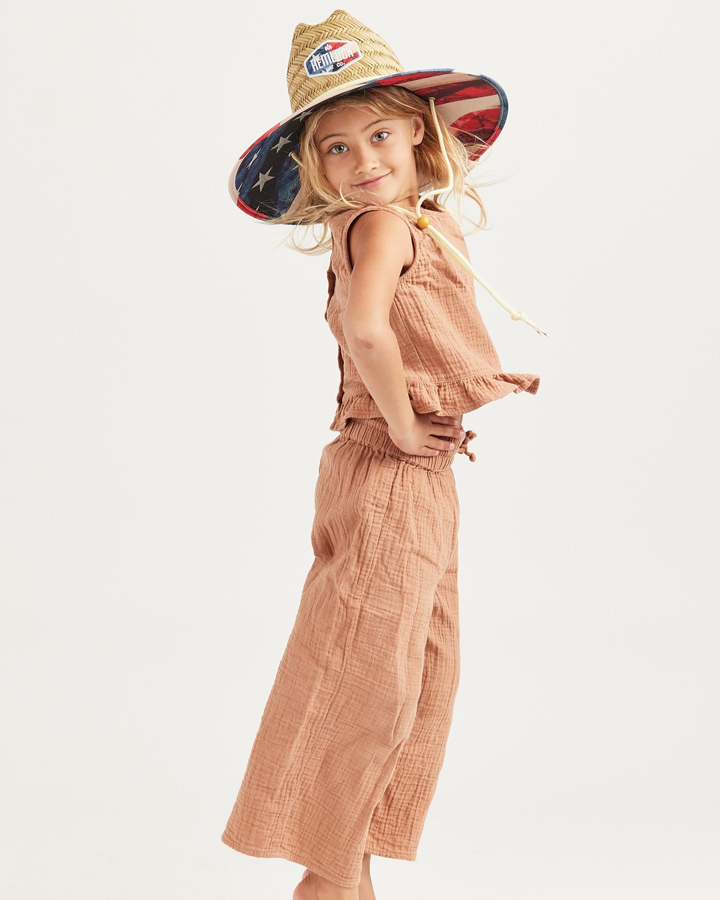 Hemlock Girl model wearing Brave Big Kids Straw Lifeguard Hat