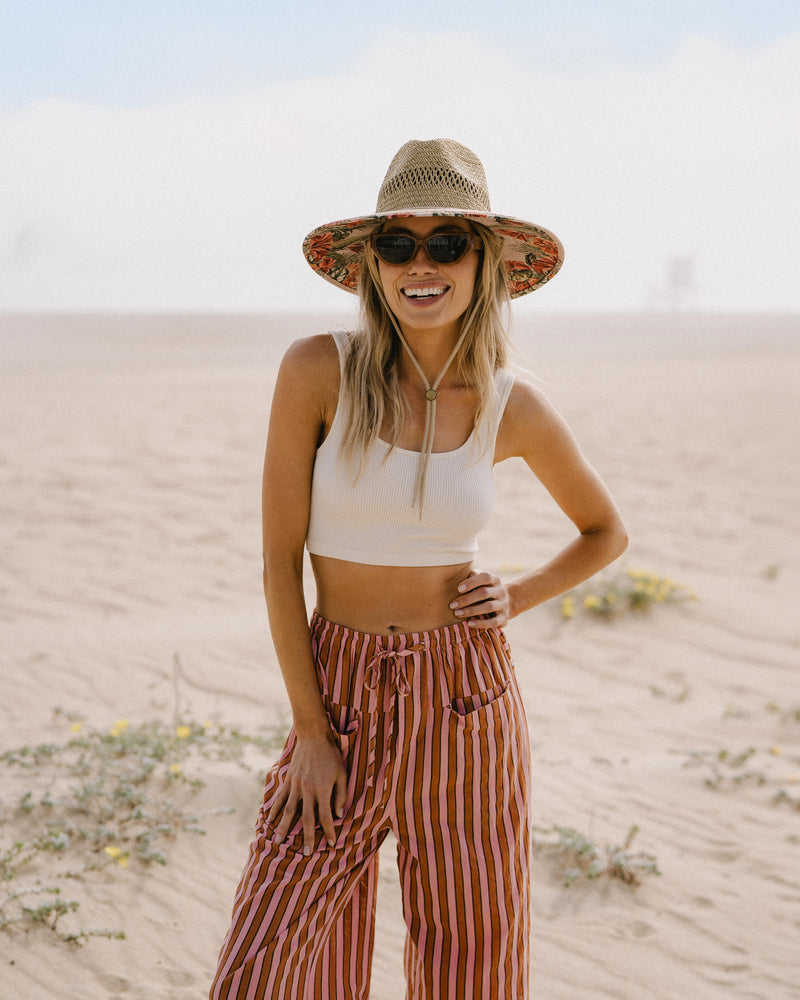 Hemlock female Model wearing the
UPF50+ Lifeguard hat in Hibiscus
print