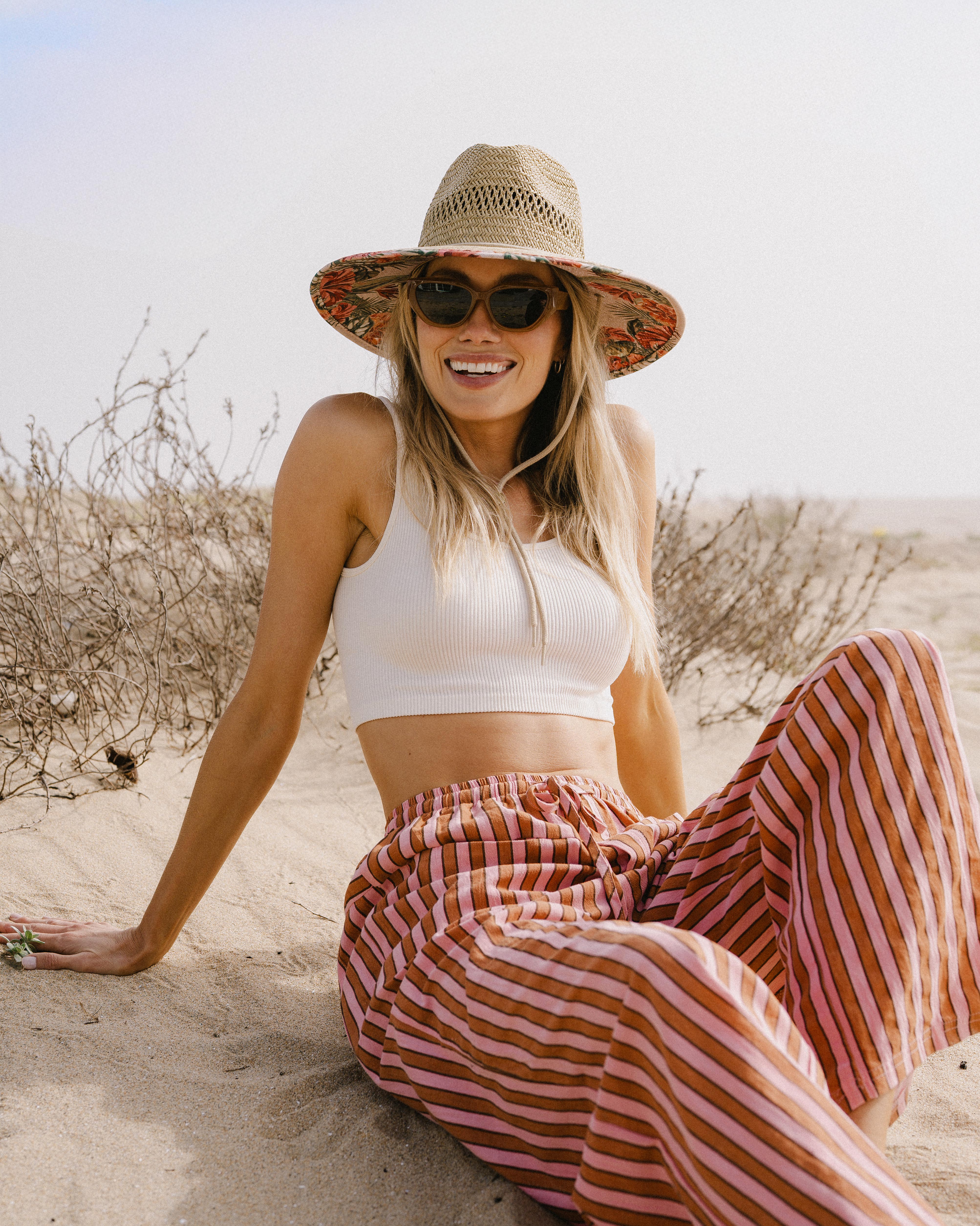 Hemlock female Model wearing the
UPF50+ Lifeguard hat in Hibiscus
print