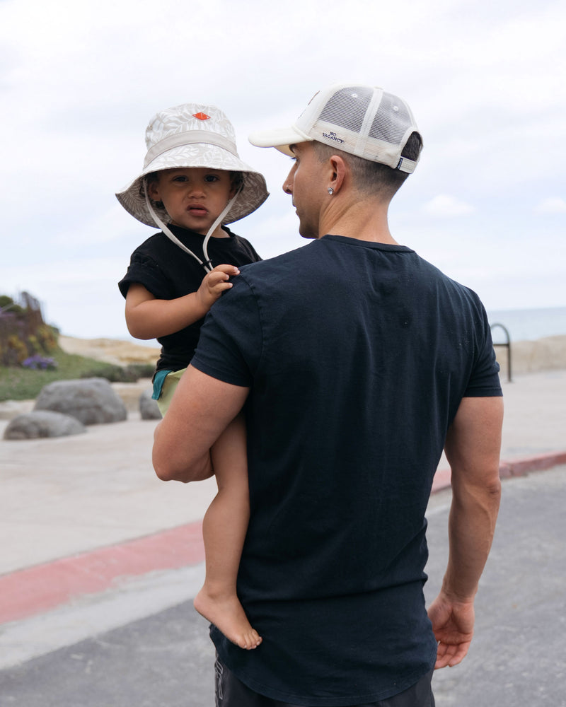 baby boy hemlock model wearing the surfari bucket hat