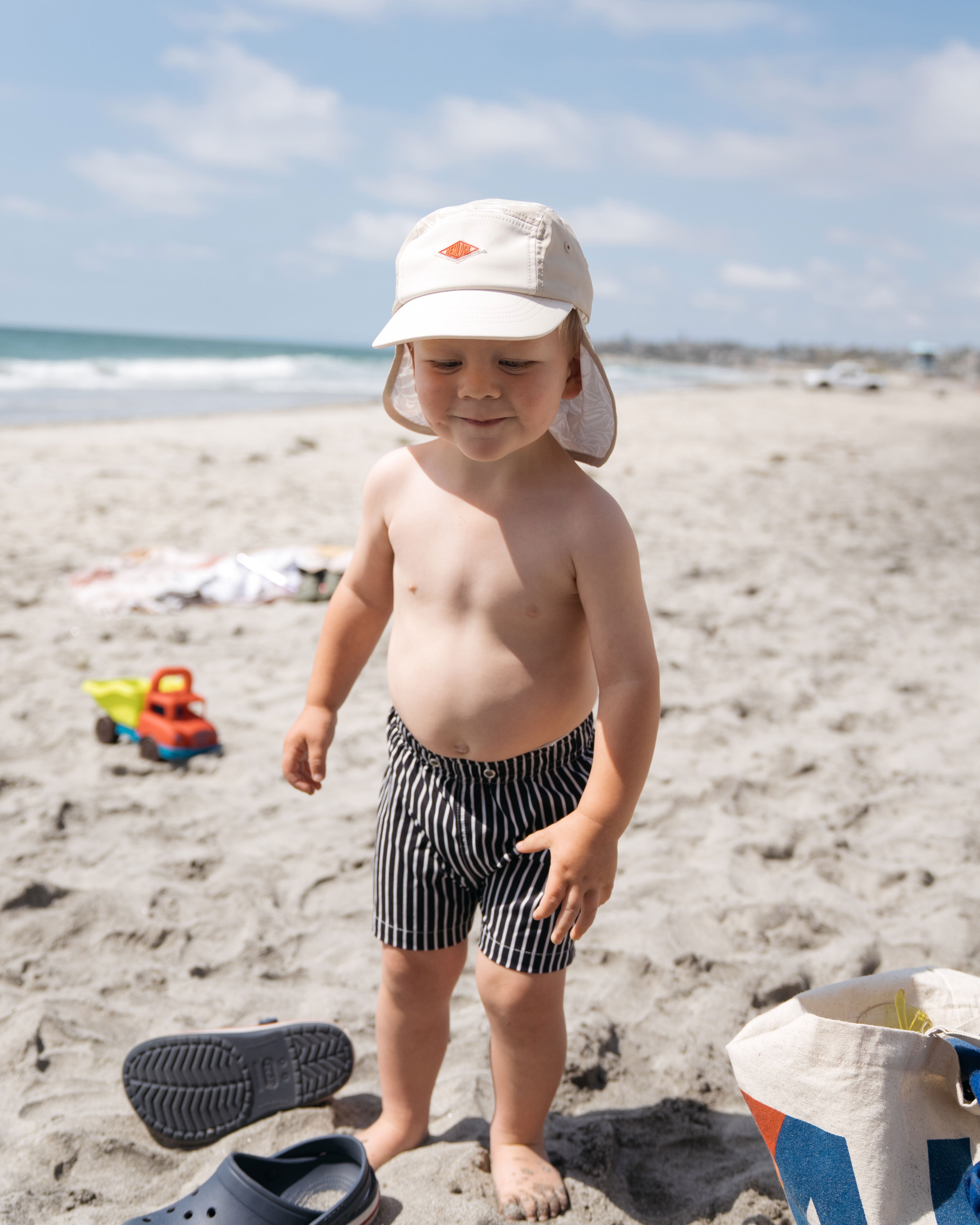 Baby boy Hemlock model wearing the Surfari Cap 