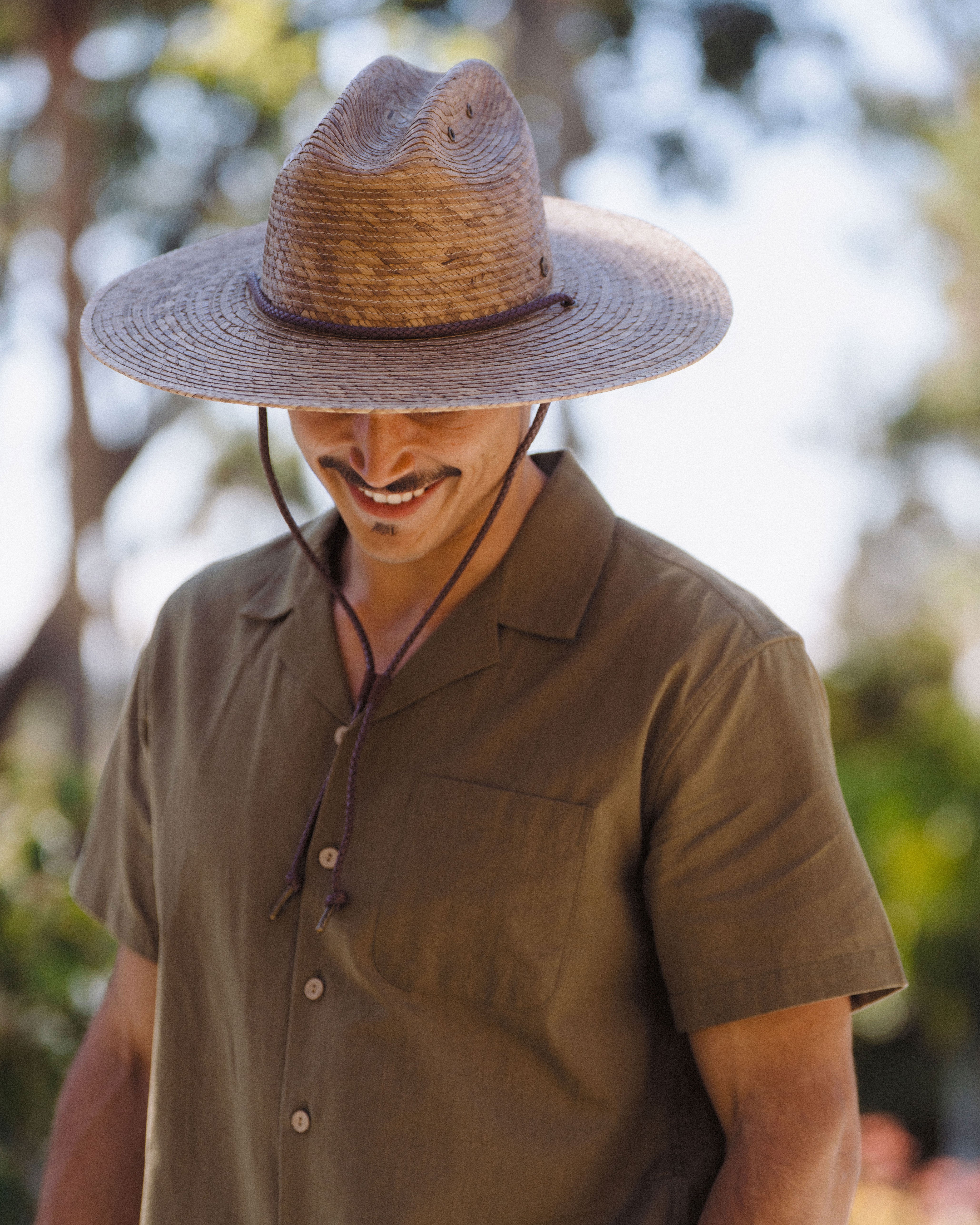 Hemlock male model wearing the Monterrey Rancher Straw Hat in Toast close up