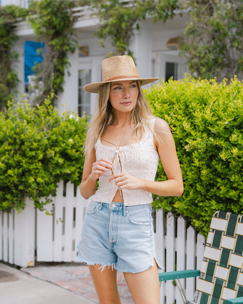 Hemlock female model Morro Fedora Straw Hat in color Toast