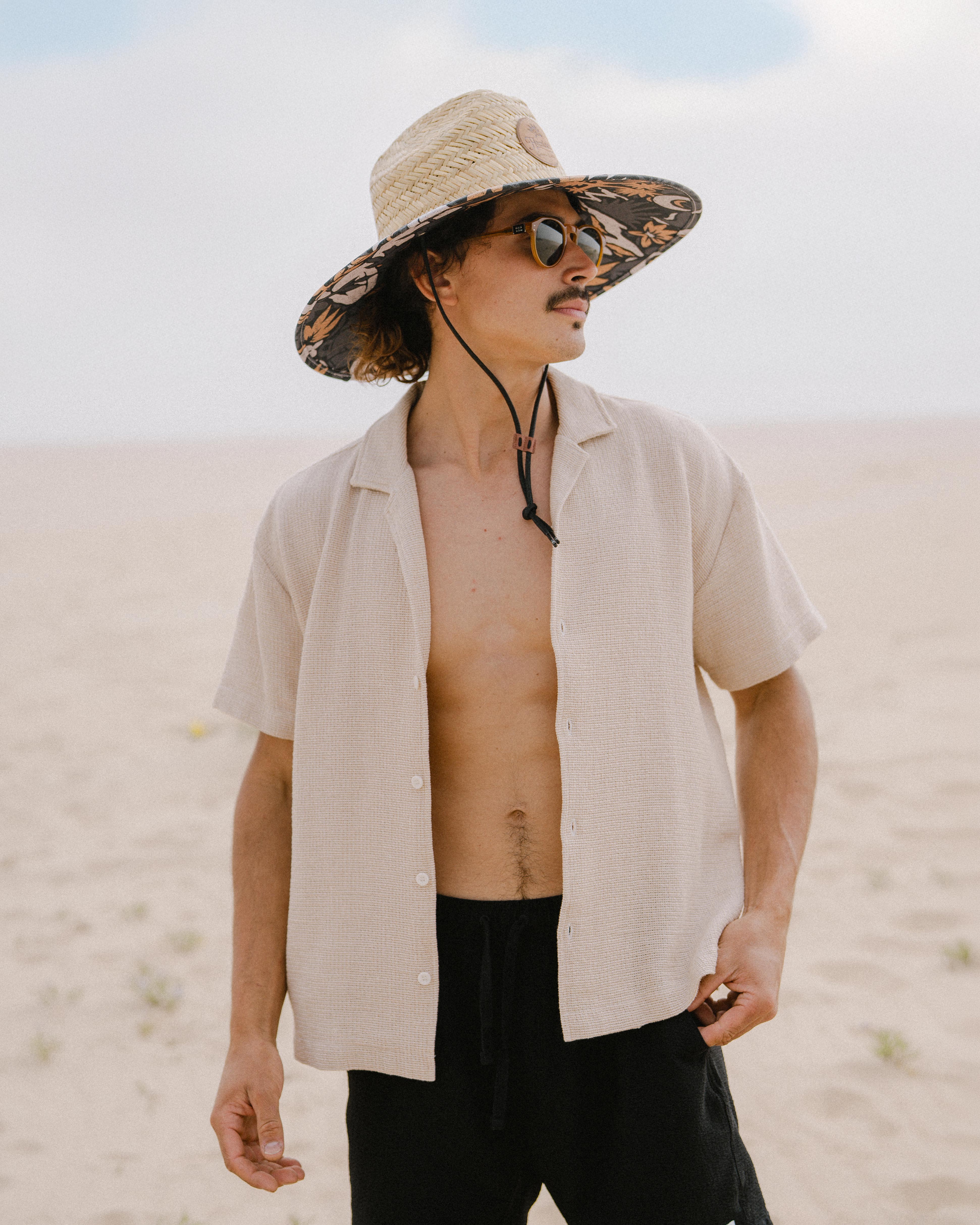 Hemlock male Model wearing the
UPF50+ Lifeguard hat in Desert Bloom
print