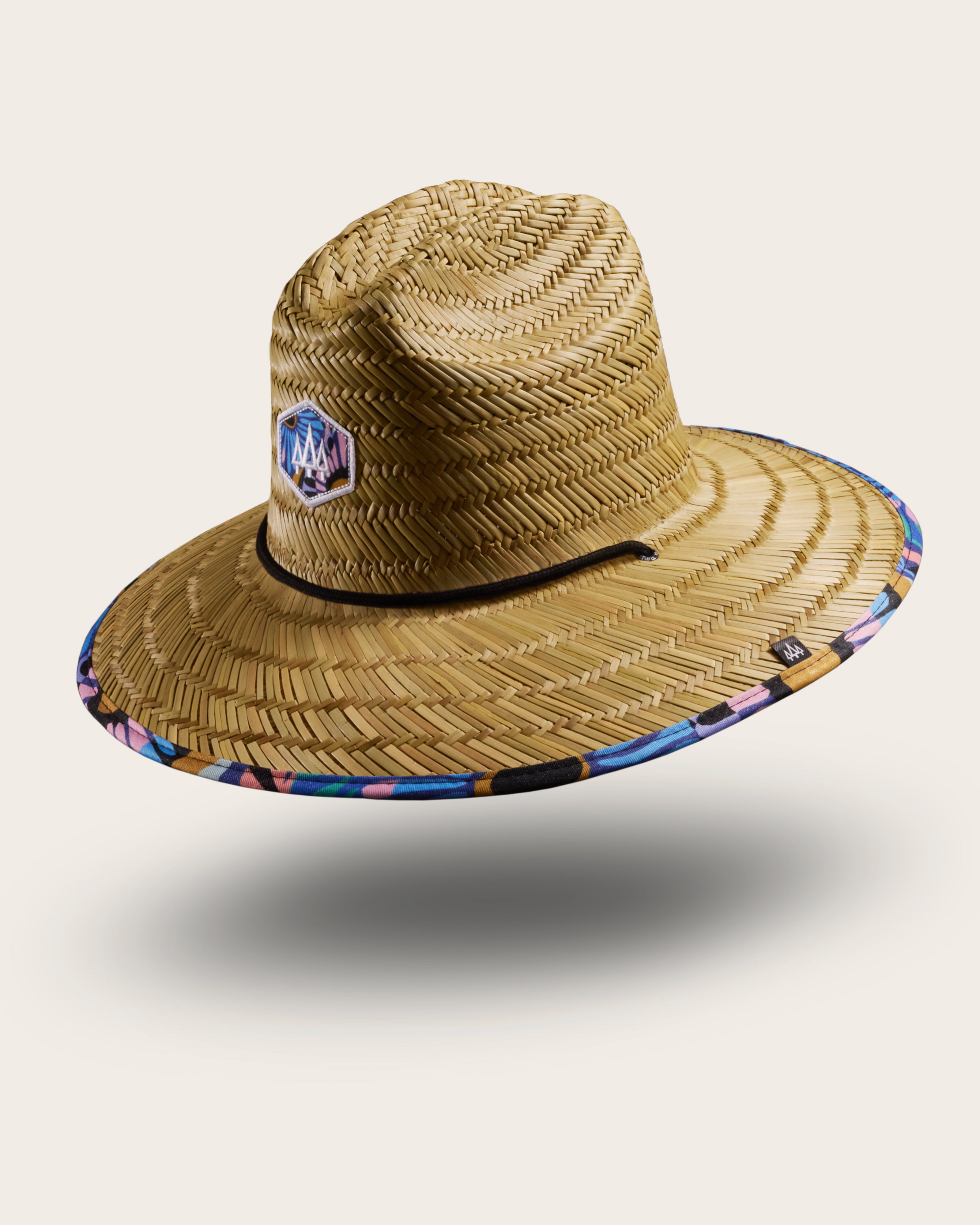 Hemlock Eden straw lifeguard hat with purple floral pattern with patch