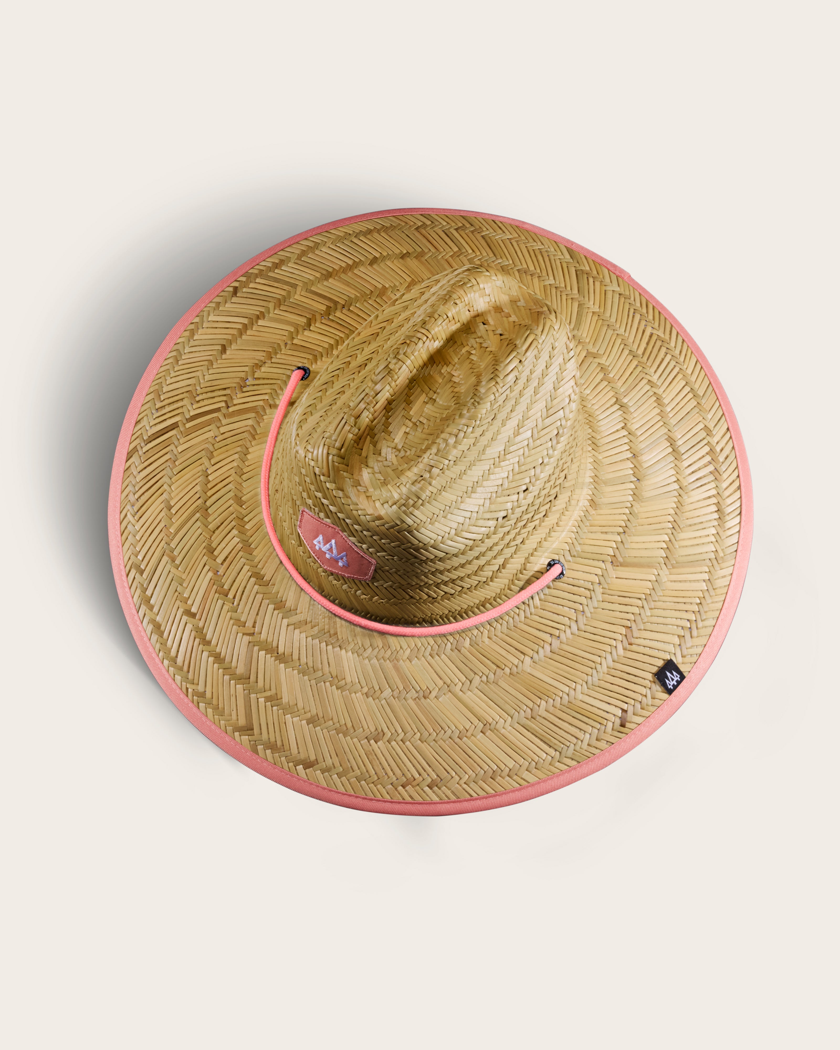 Hemlock Guava straw lifeguard hat with coral color top of hat
