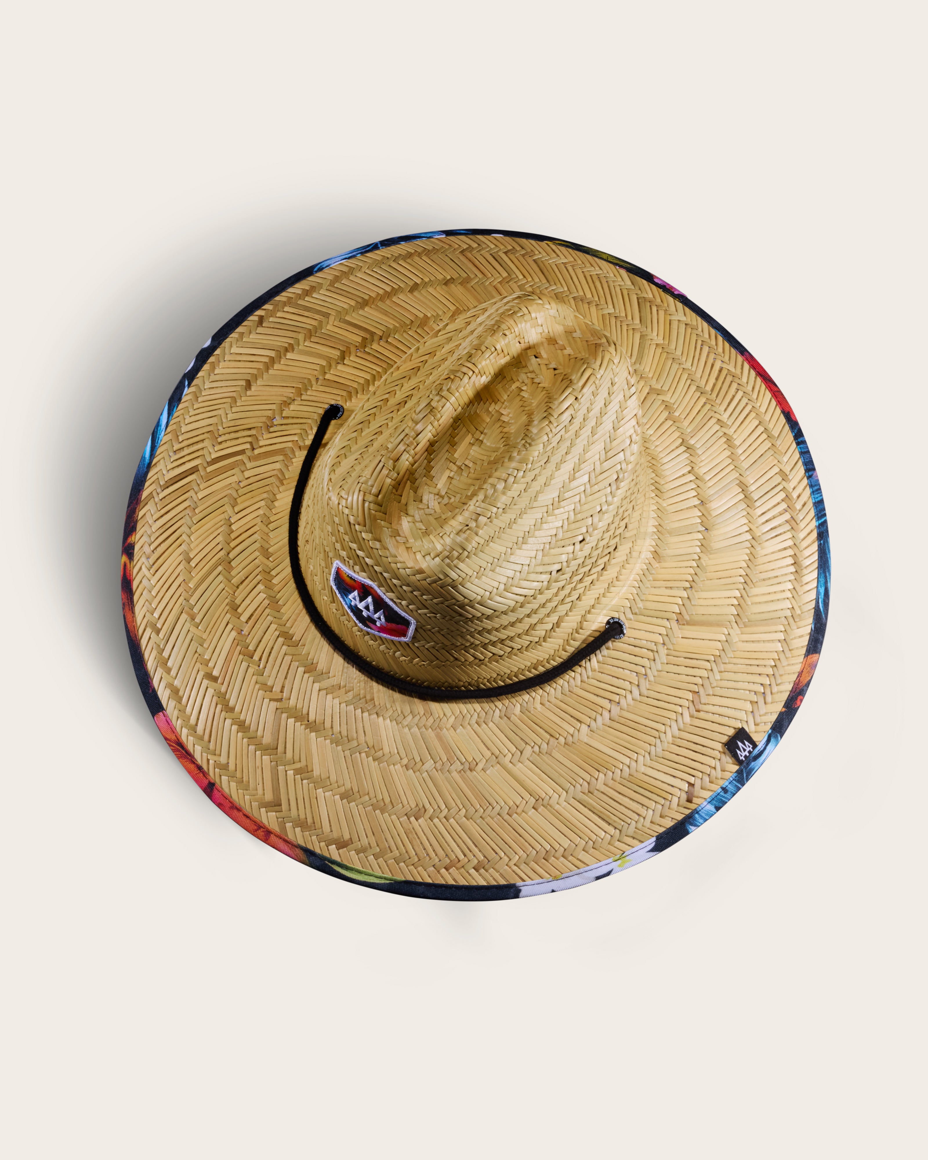 Hemlock Kailua straw lifeguard hat with hawaiian floral pattern top of hat