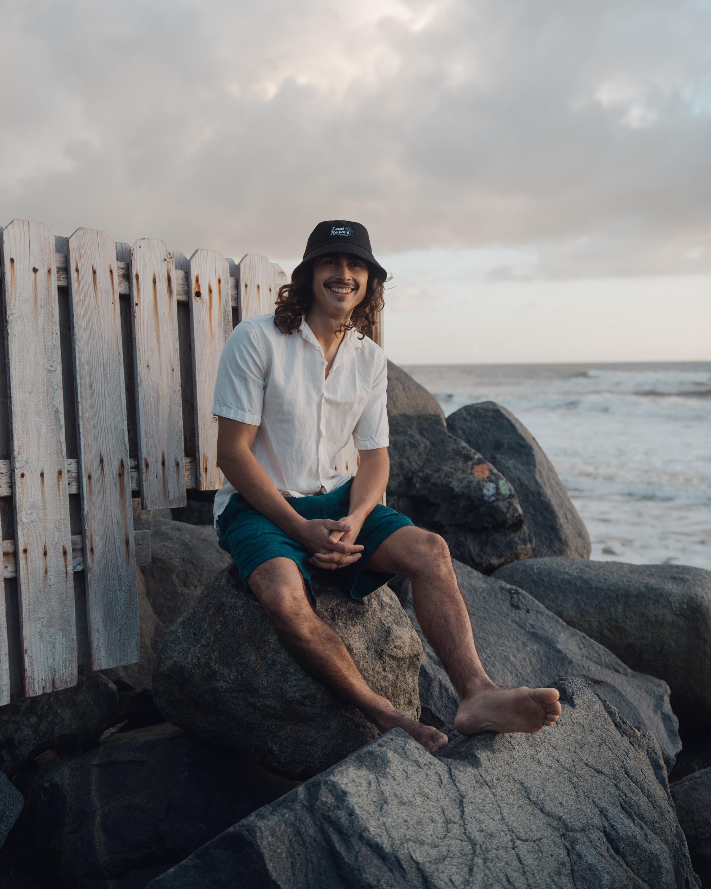 Hemlock male model looking straight wearing Hemlock Last Resort Cotton Bucket Hat in Black