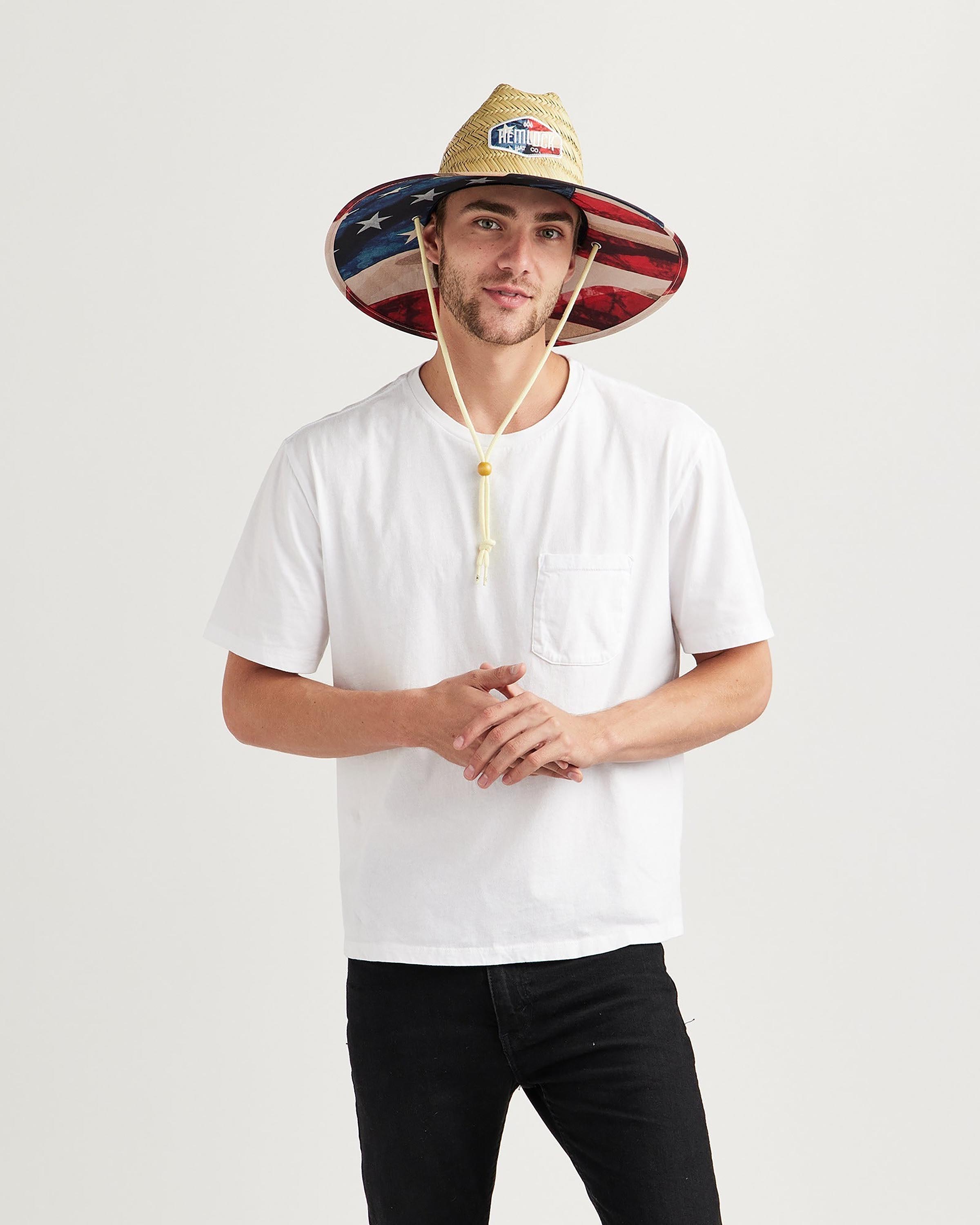 Hemlock male model looking straight wearing Liberty straw lifeguard hat with USA flag pattern