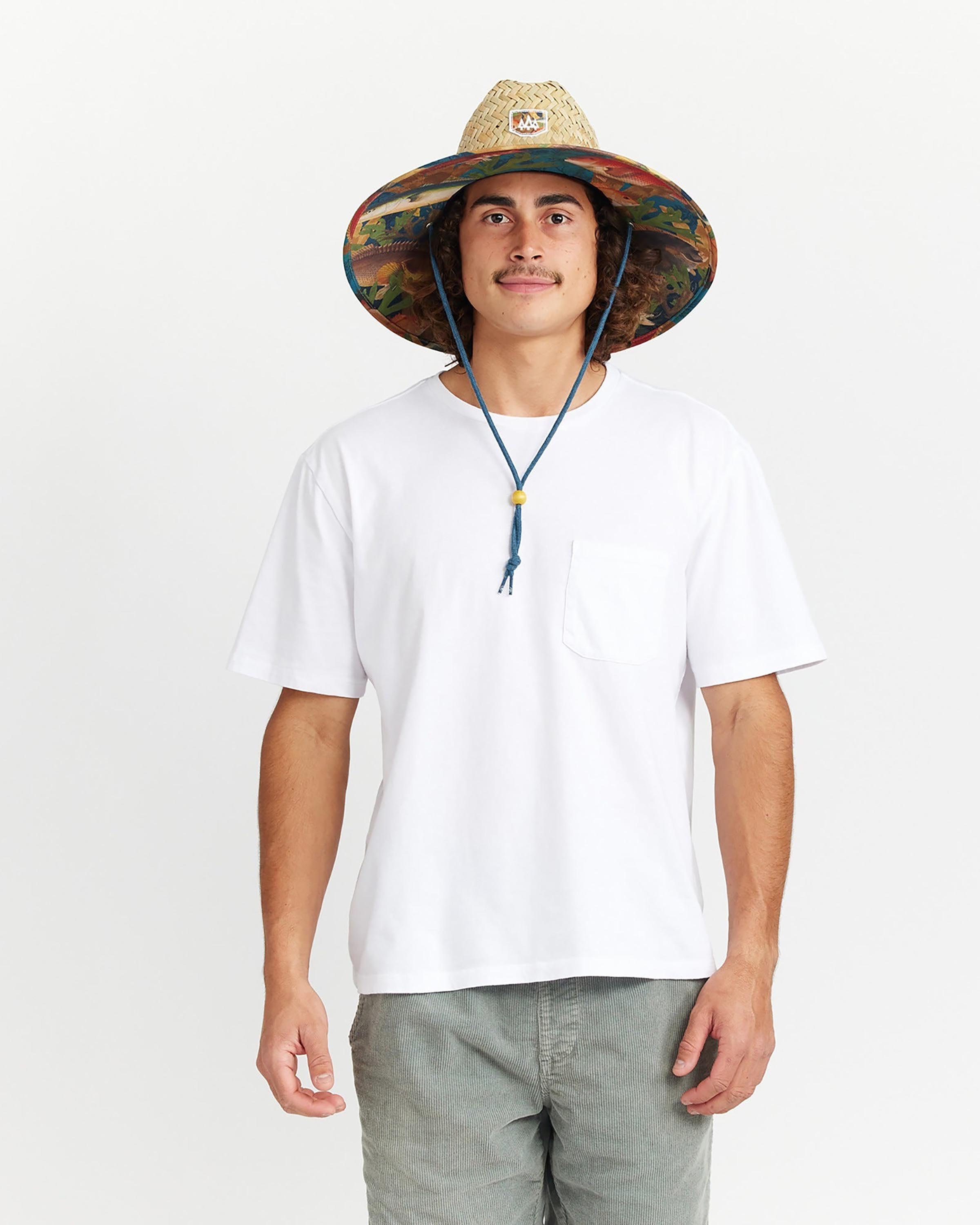 Hemlock male model looking straight wearing Mariner straw lifeguard hat with saltwater fish pattern