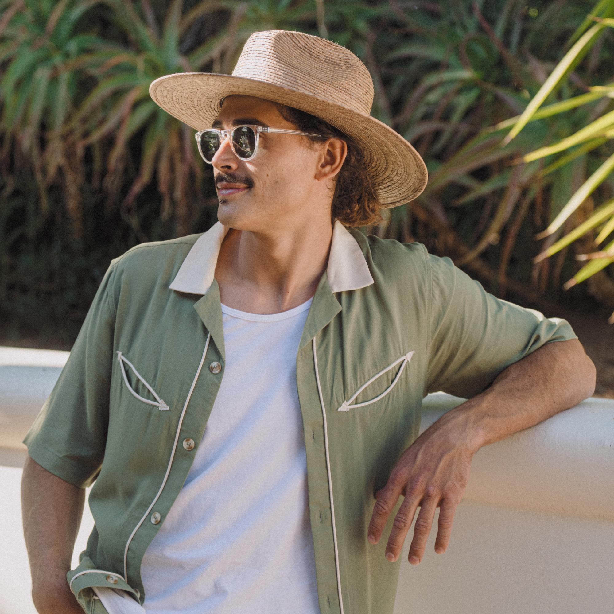 hemlock male model wearing the madero straw fedora in toast - best sellers