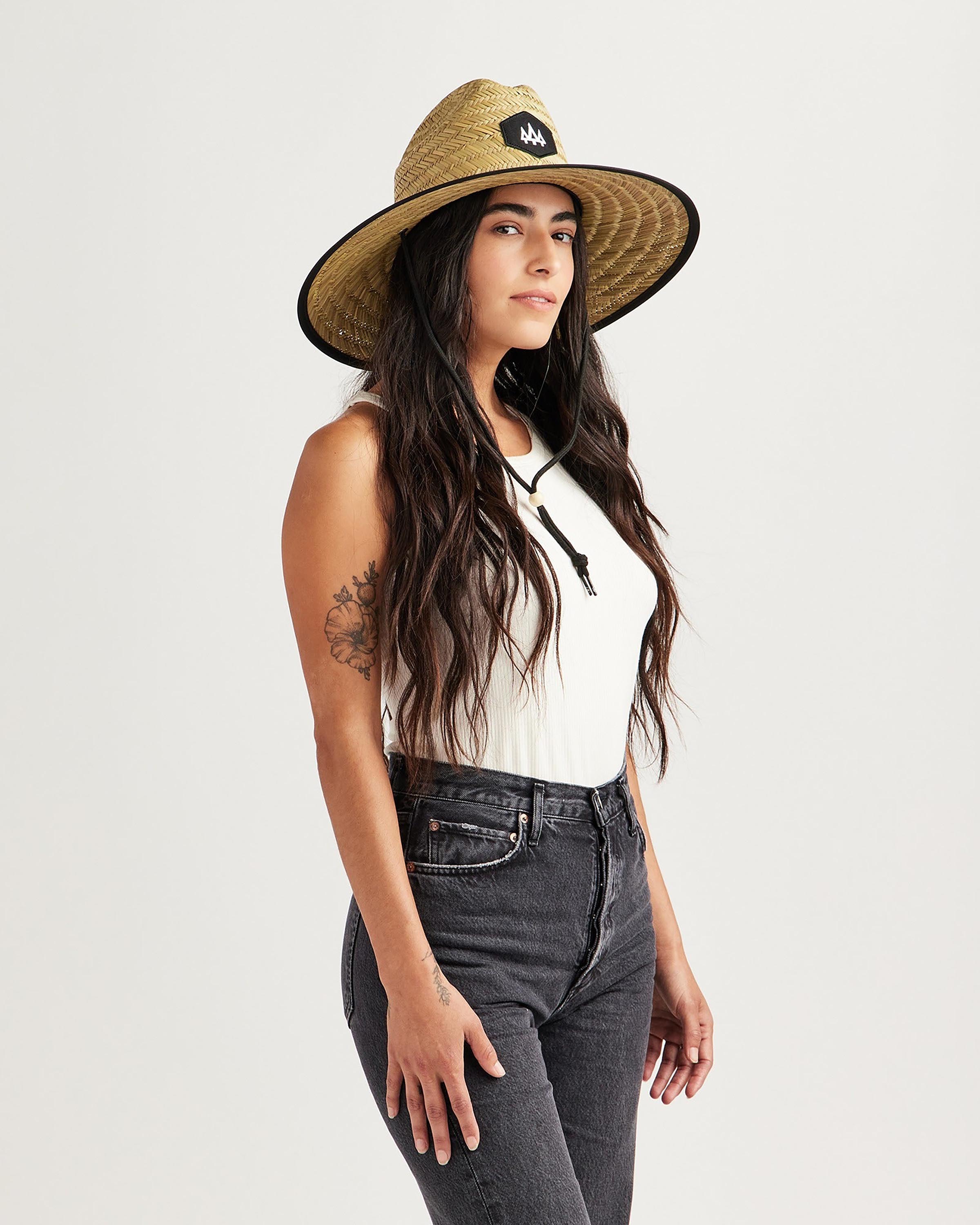 Hemlock female model looking to the side wearing Midnight straw lifeguard hat with black color