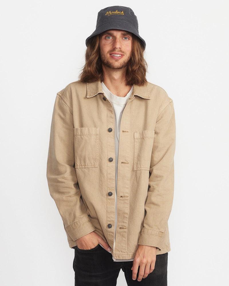 Hemlock male model looking straight wearing Newport Corduroy Bucket Hat in Dusty Blue