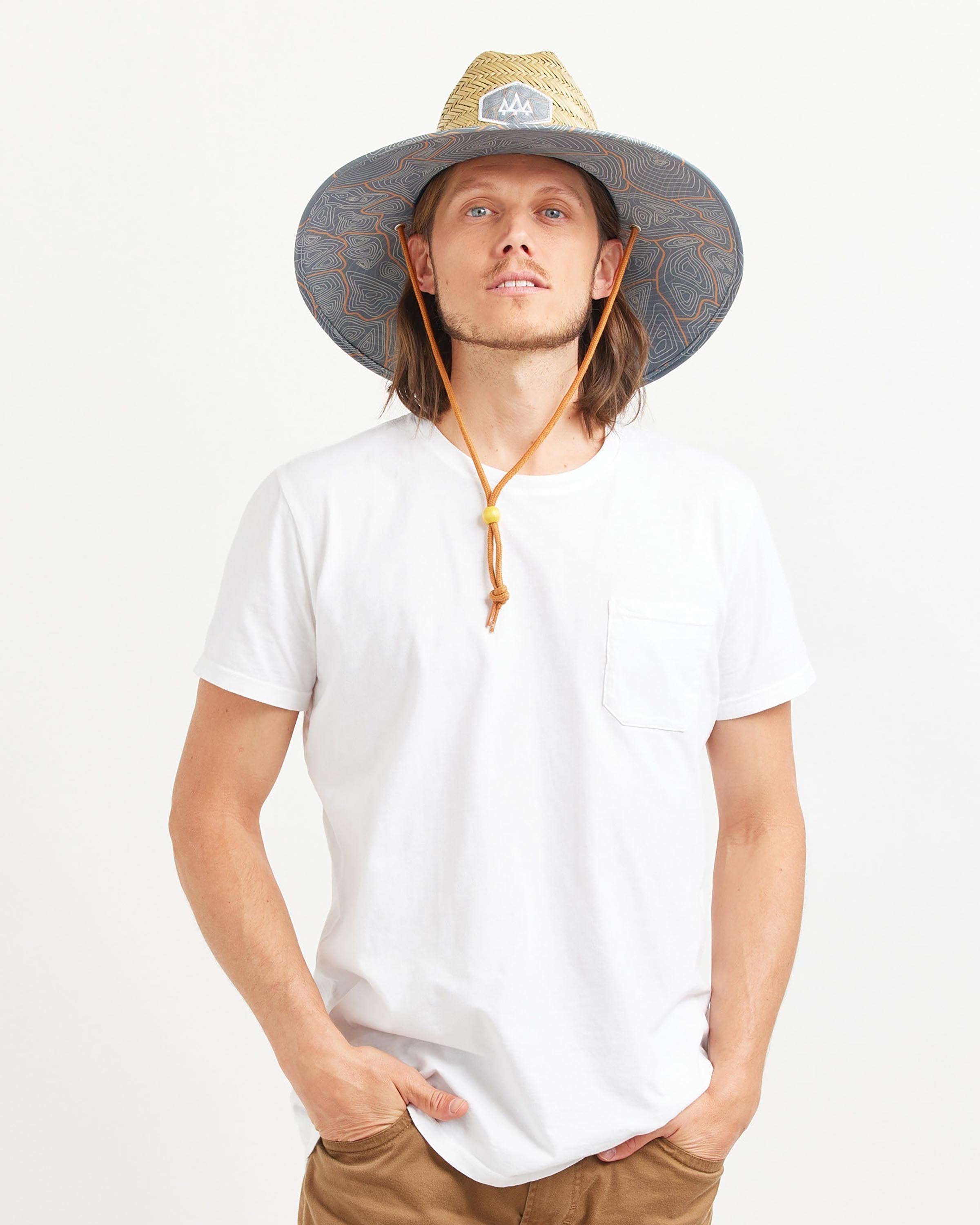 Hemlock male model looking straight wearing Nomad straw lifeguard hat with topography pattern