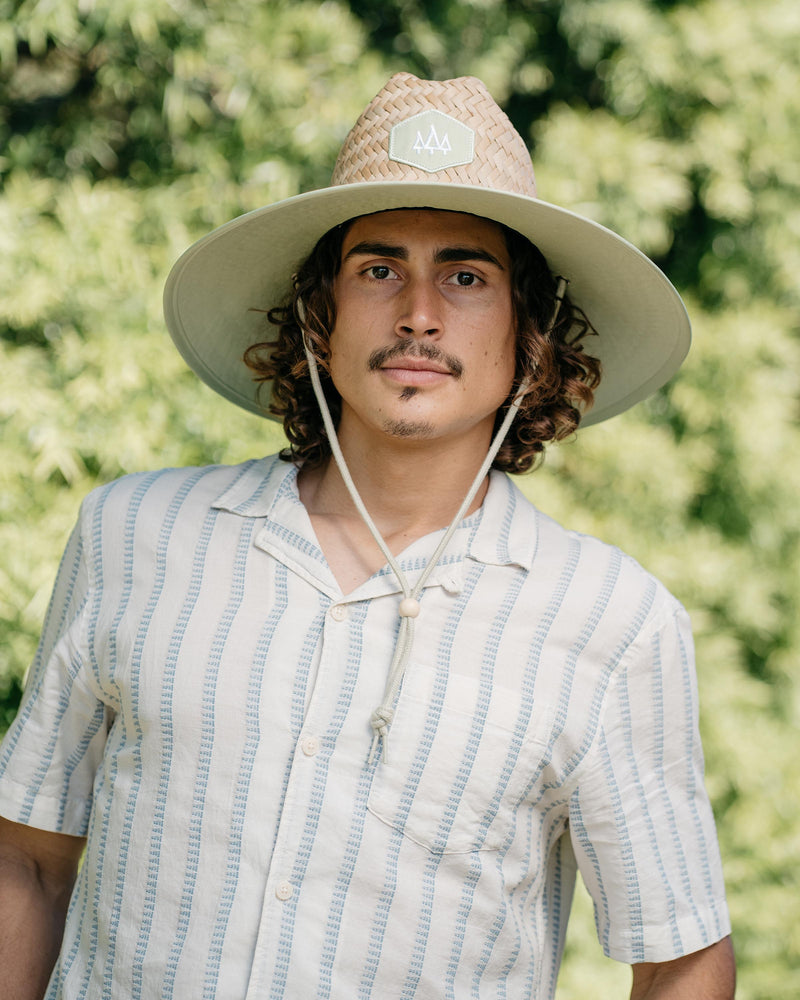 Hemlock male model looking straight wearing Pistachio straw lifeguard hat with green color