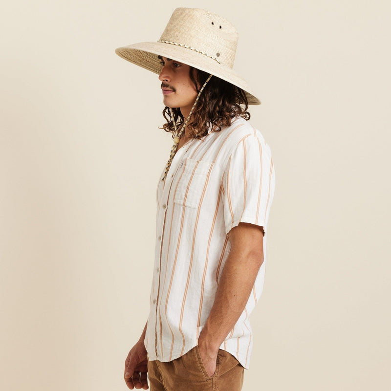 Hemlock male model looking left wearing Santos Straw Lifeguard Hat in Natural