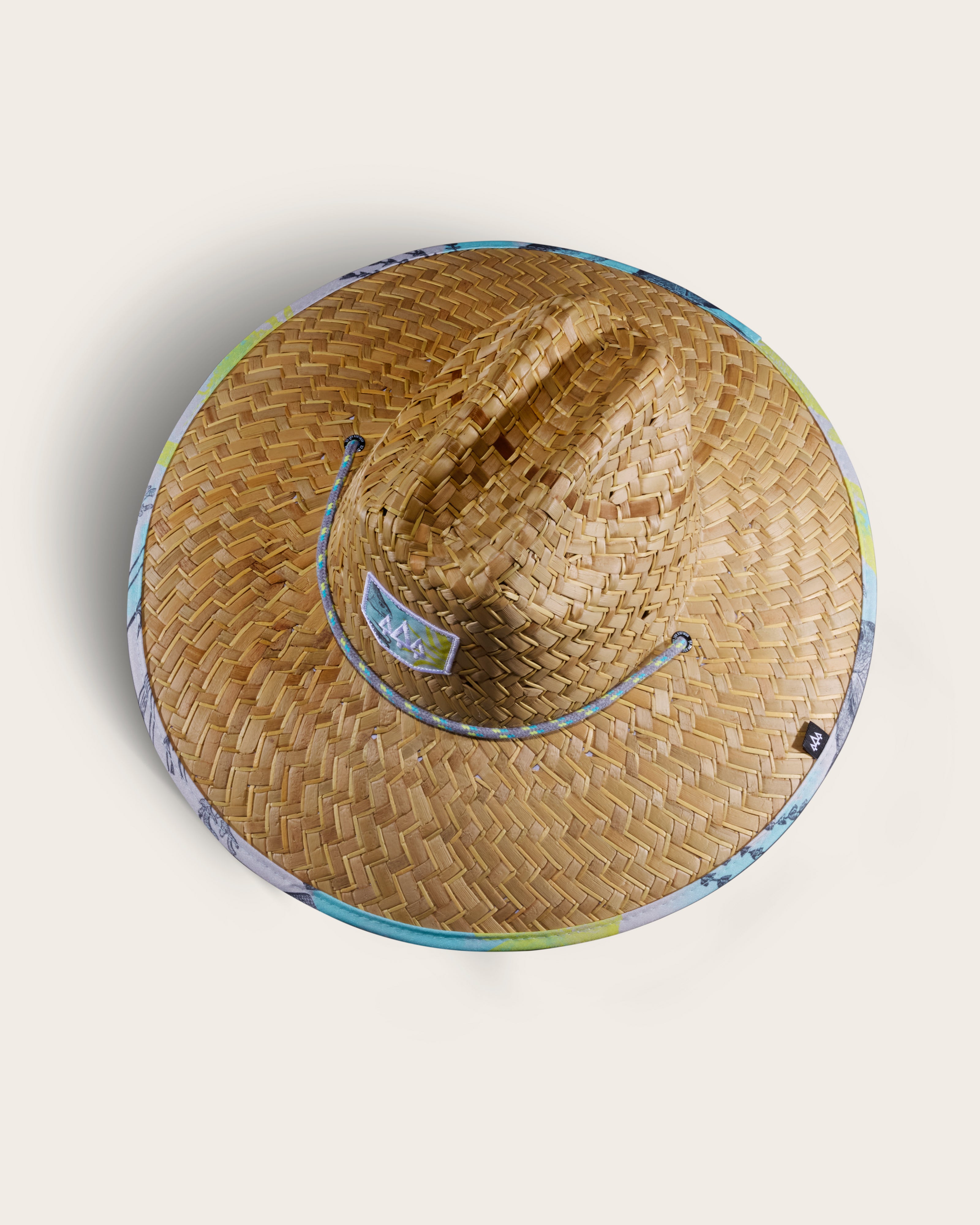 Hemlock Skipper straw lifeguard hat with saltwater neon pattern top of hat
