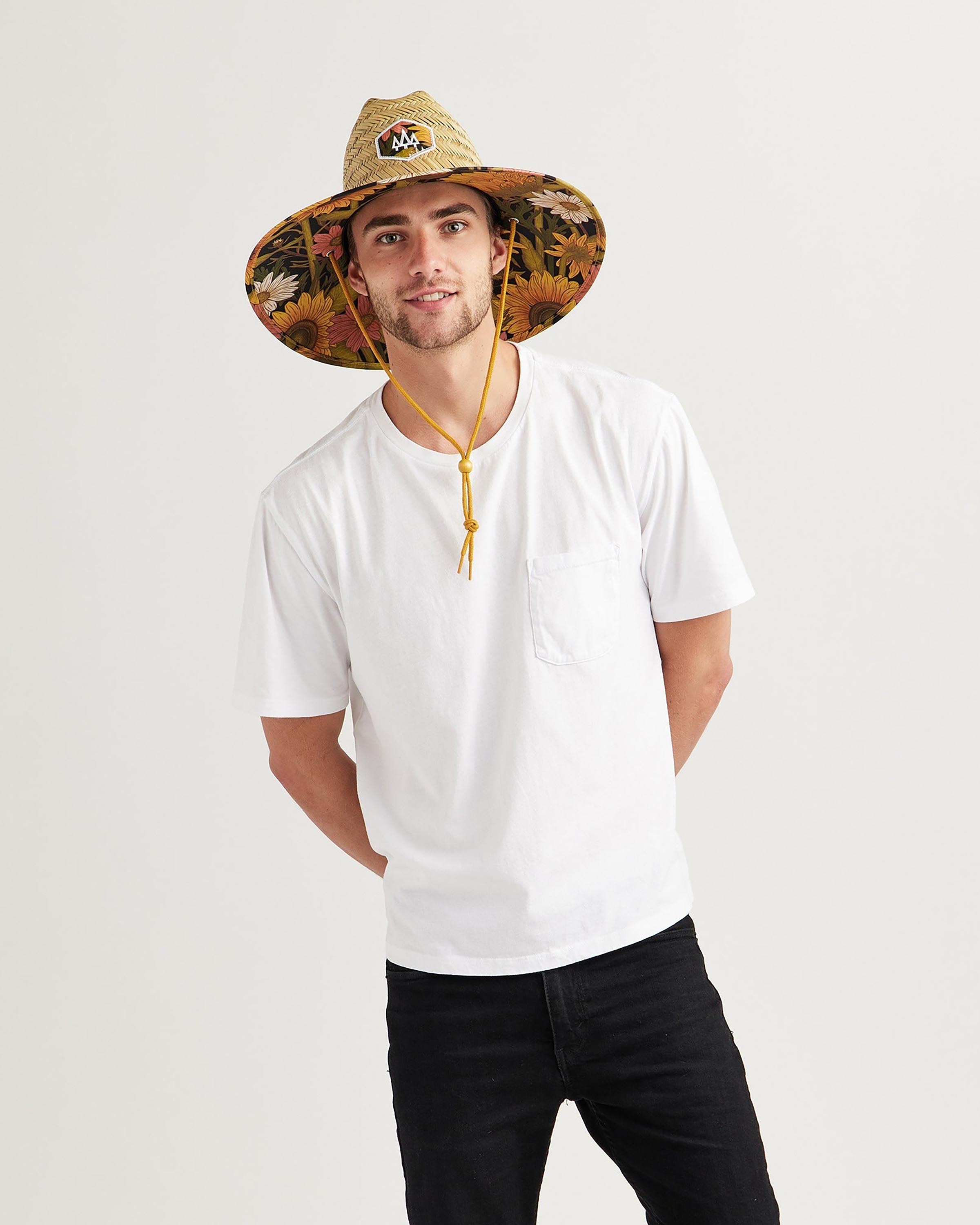 Hemlock male model looking straight wearing Woodstock straw lifeguard hat with sunflower pattern