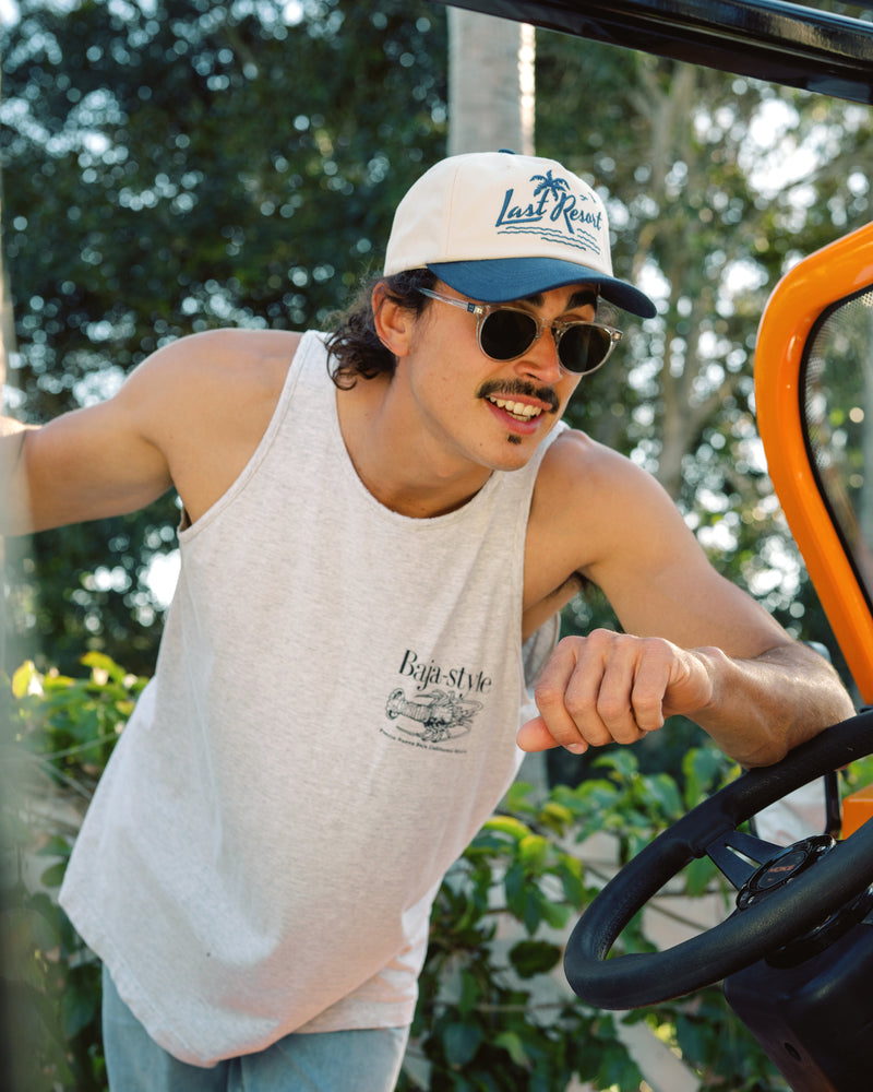 Hemlock male model wearing the Last Resort Baseball Hat in Navy