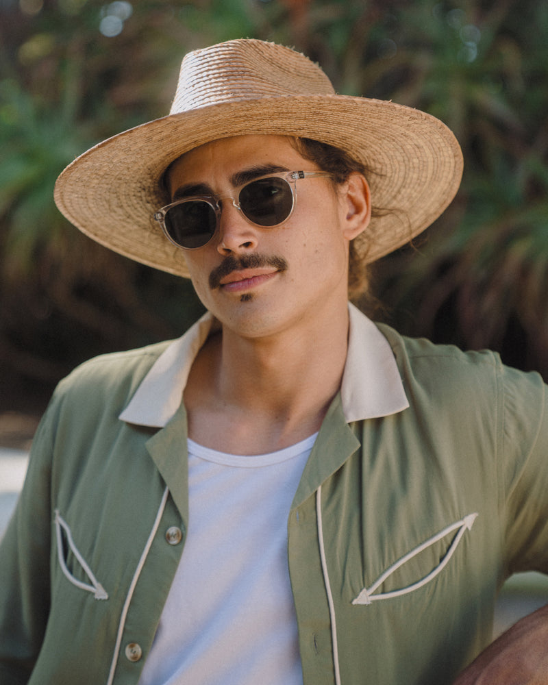 Hemlock male model wearing the Madero Fedora Straw Hat in Toast close up