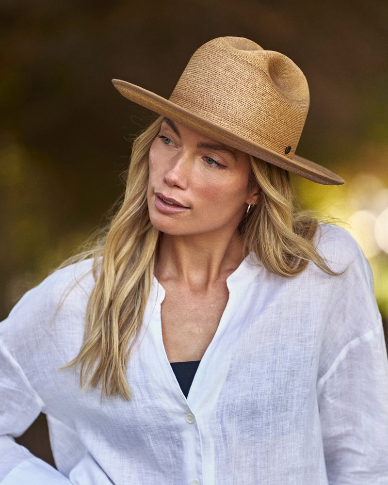 Hemlock female model wearing Hemlock Mateo Straw Rancher Hat in Saddle closeup