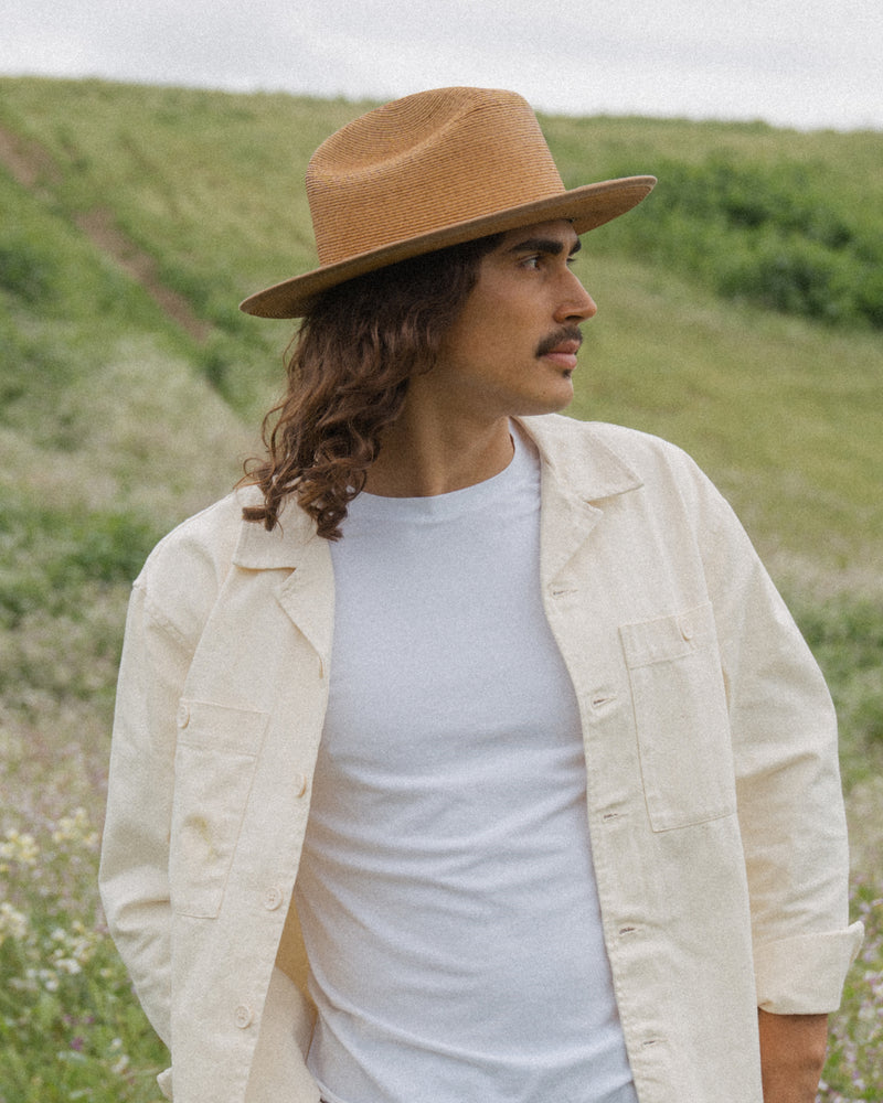 Hemlock male model side profile looking right wearing Hemlock Mateo Straw Rancher Hat in Saddle