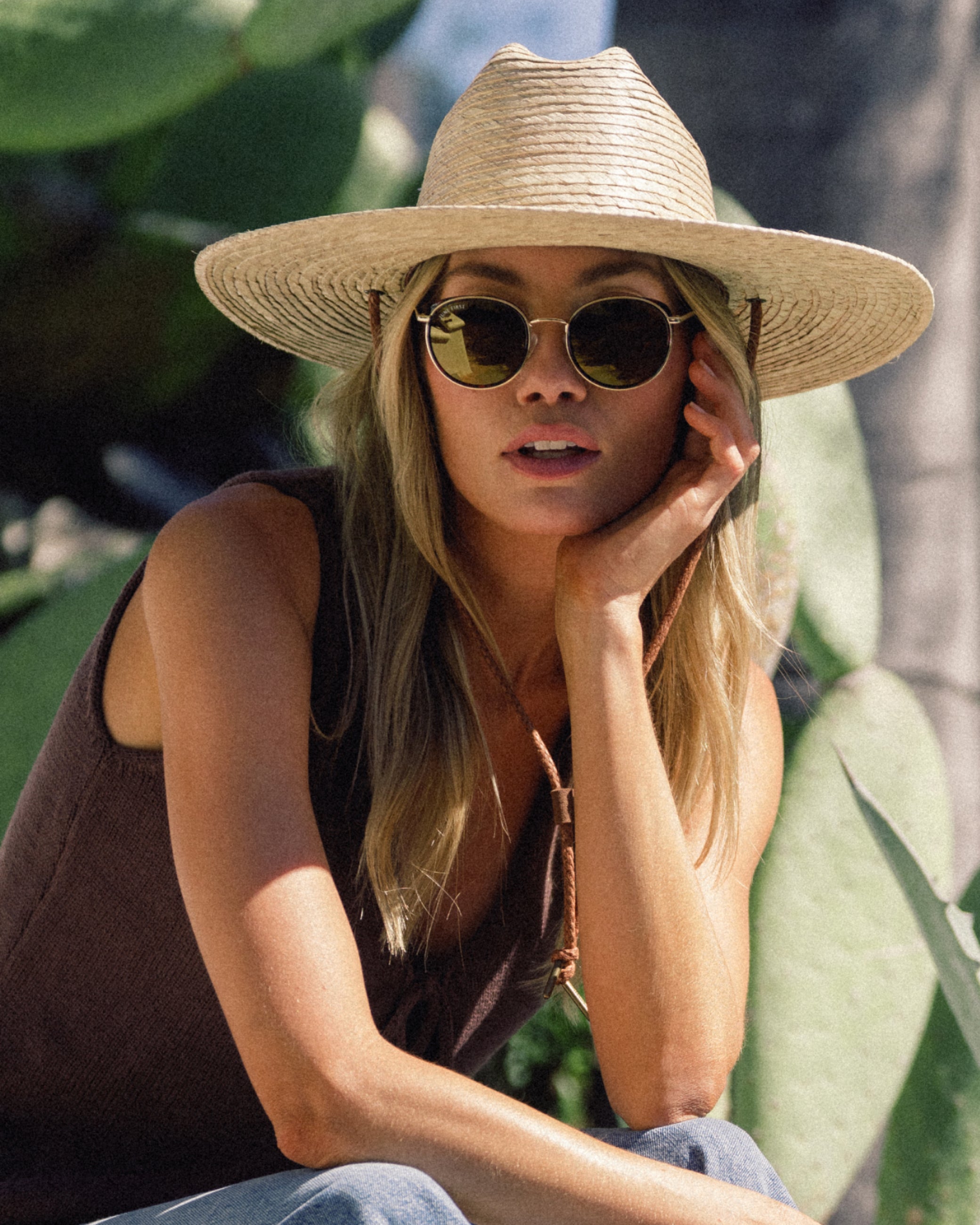Hemlock female model wearing the Monterrey Straw Hat in Natural close up