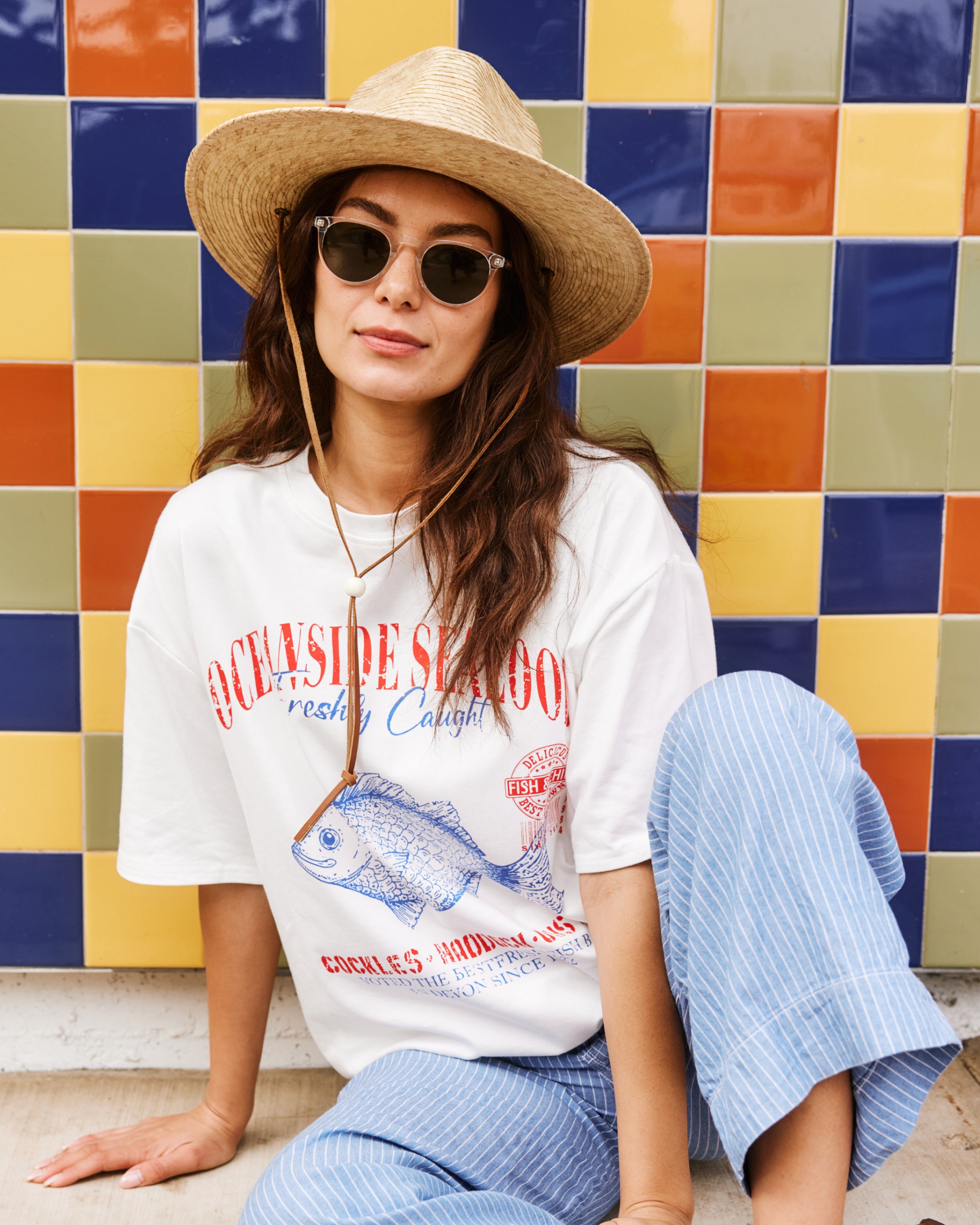 Hemlock female model wearing the Morro Fedora Straw Hat in Natural