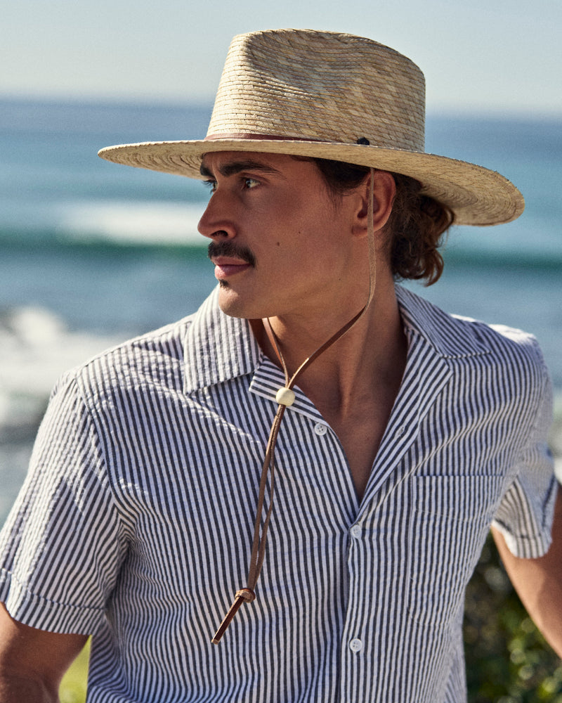 Hemlock male model wearing the Morro Fedora Straw Hat in Natural