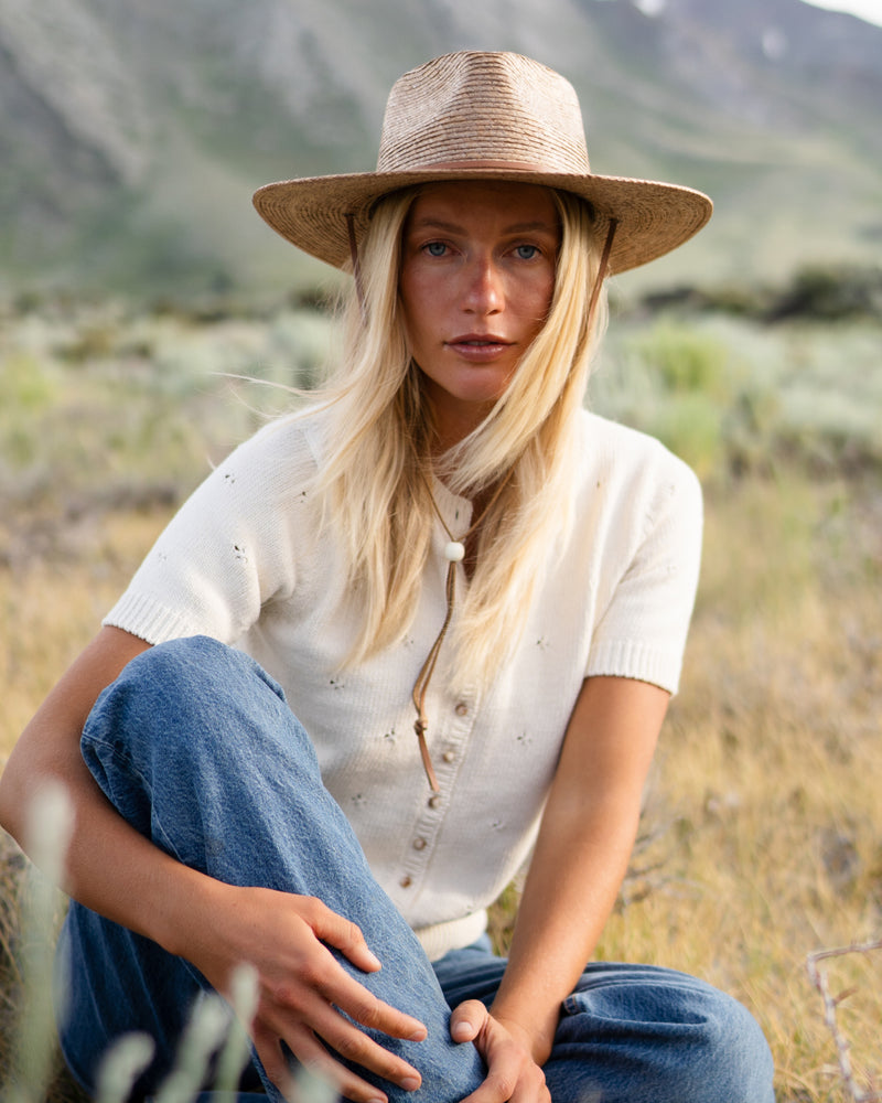female model wearing the Hemlock Morro Fedora Straw Hat in color Toast