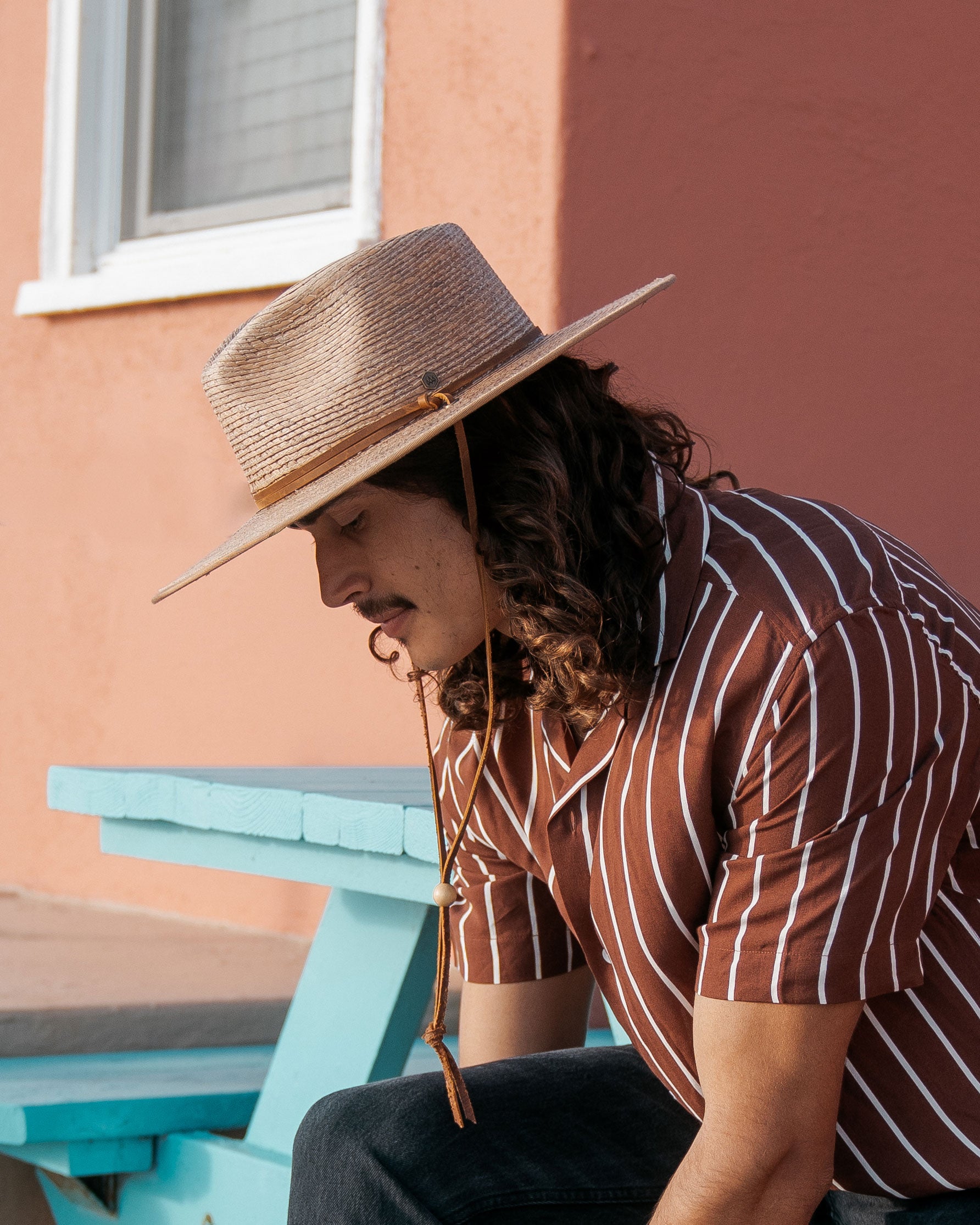 Hemlock male model wearing the Morro Fedora Straw Hat in color Toast