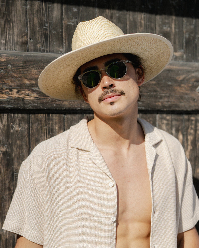 Hemlock male model wearing the Toluca Rancher Straw Hat in Sand close up