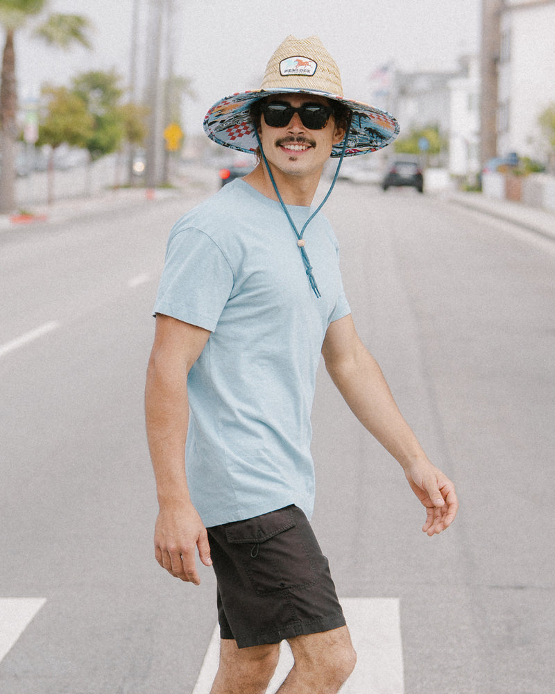 Hemlock male model wearing the UPF 50+ Lifeguard in Racing Legends while crossing the street