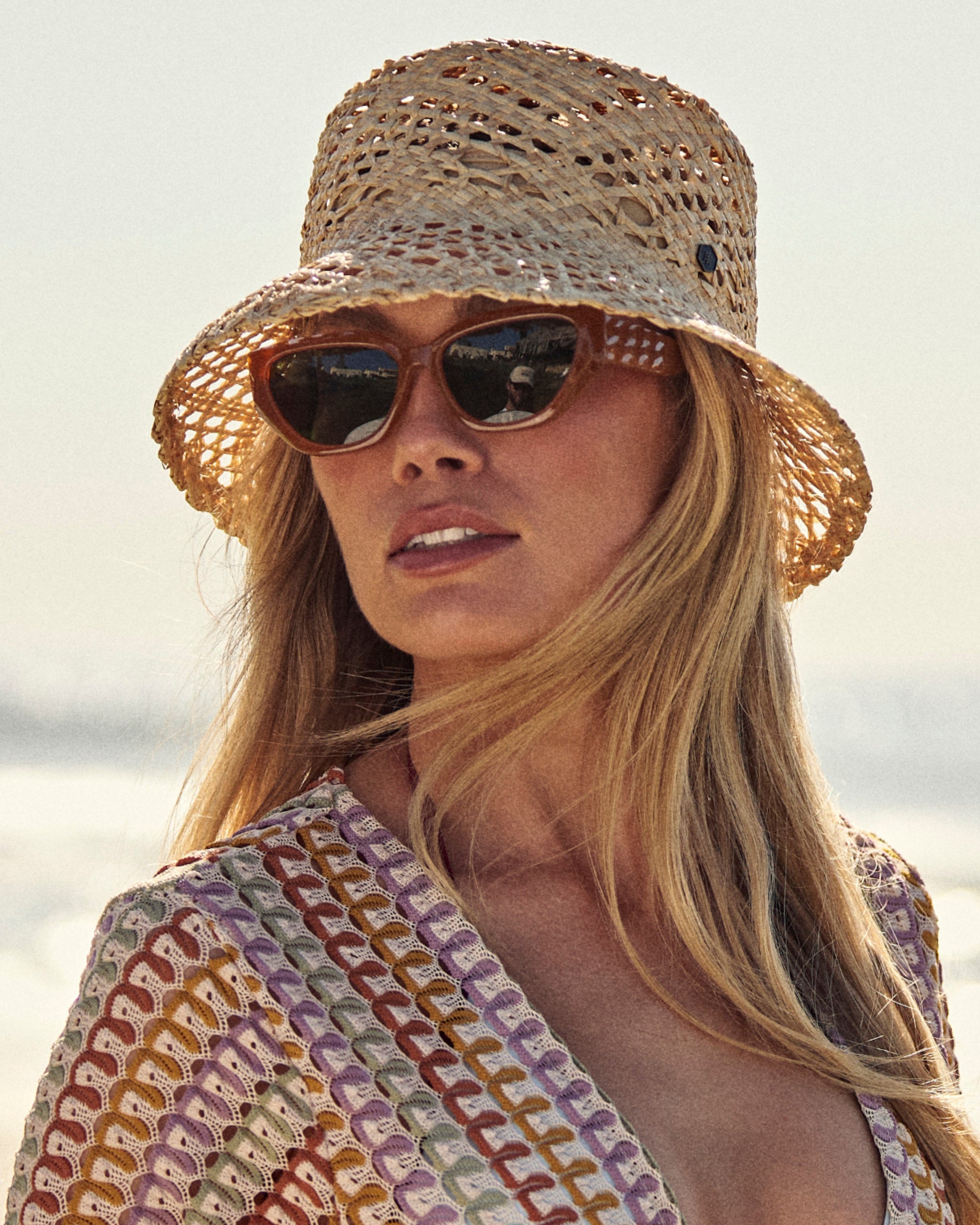 Hemlock female model wearing the Sofia Straw Bucket closeup 